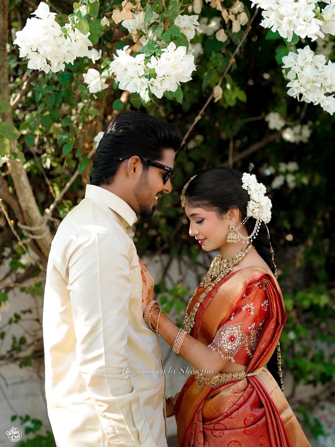Red & Sandal Couple II — Reception couple look — coordinated colour palette, editorial finish.