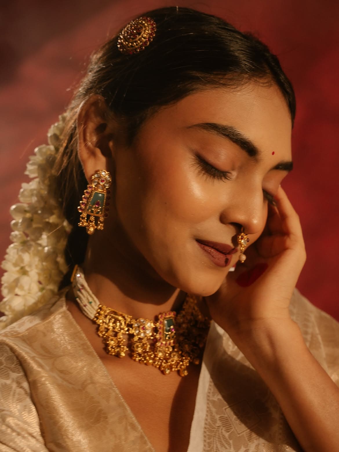 Crimson Bridal IV — Classic South Indian bridal — kohl-rimmed eyes, gold accents.
